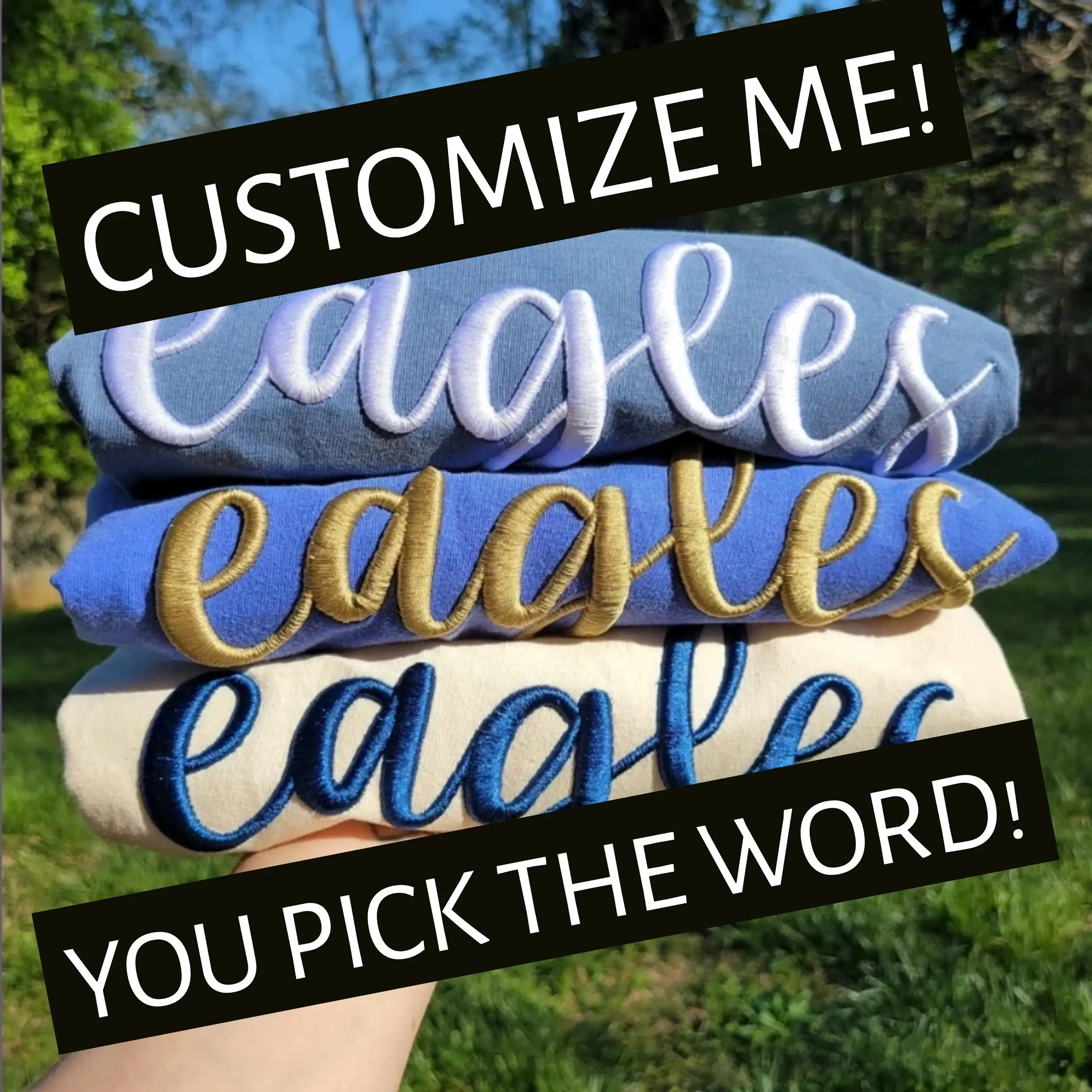 A stack of four eagles shirts with the words " customize me ".