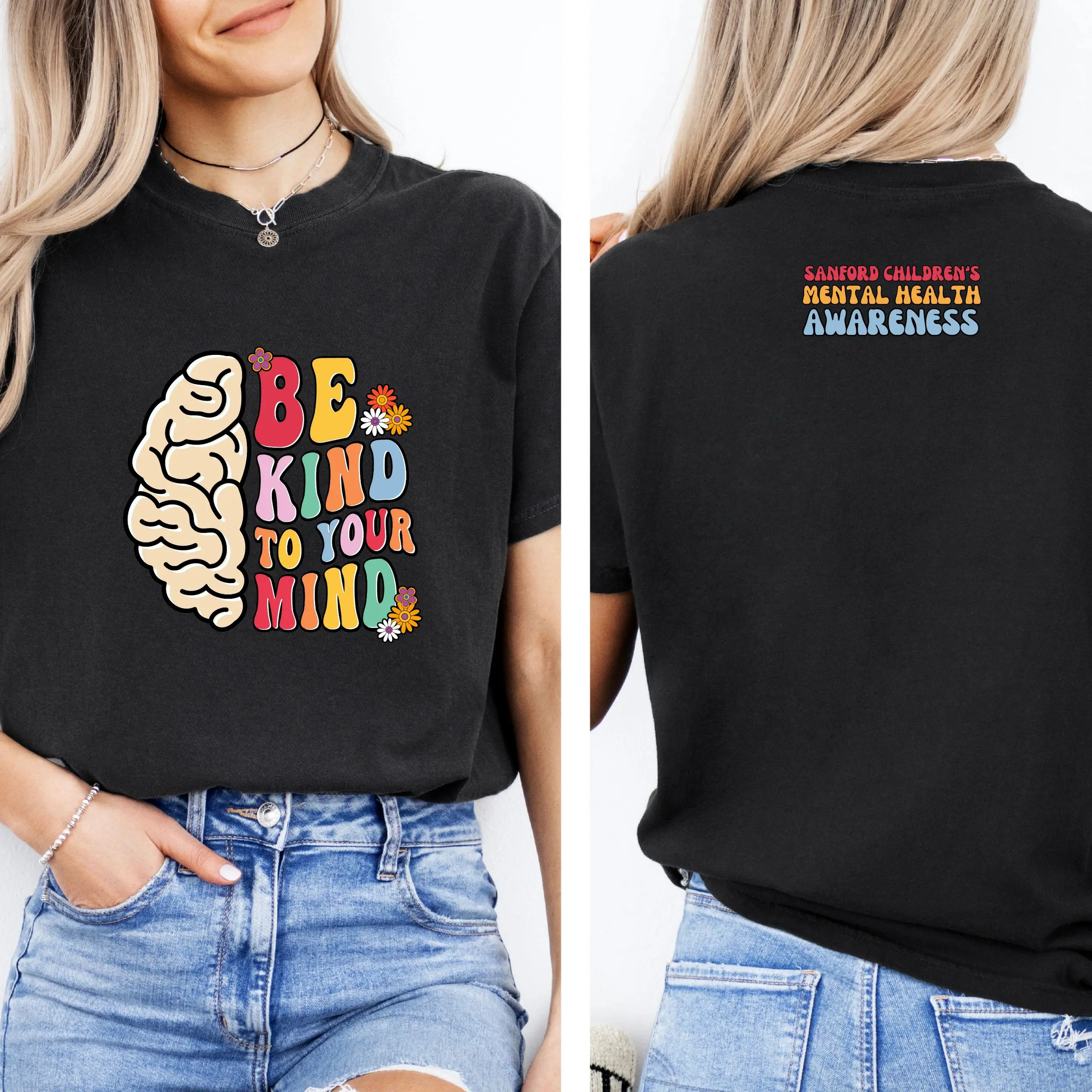 A black shirt that has a picture of a brain on it.