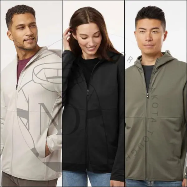 Three people wearing jackets and one is holding a cell phone.