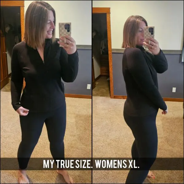 A woman taking a selfie in front of the mirror.