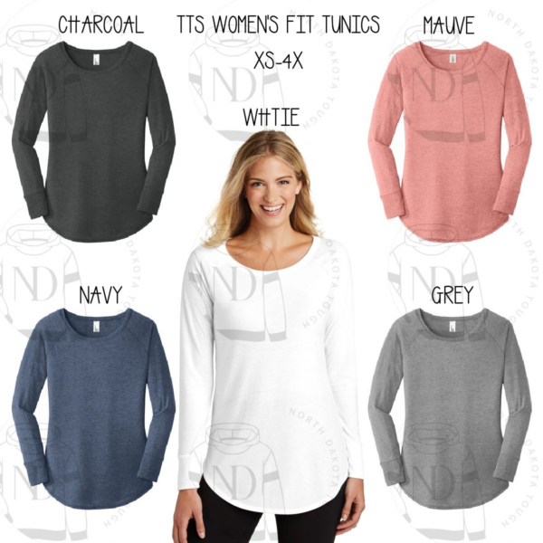 A woman wearing different colors of long sleeve shirts.