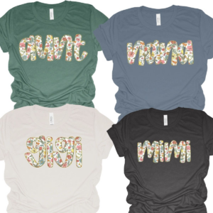 A group of four shirts with different colored letters.