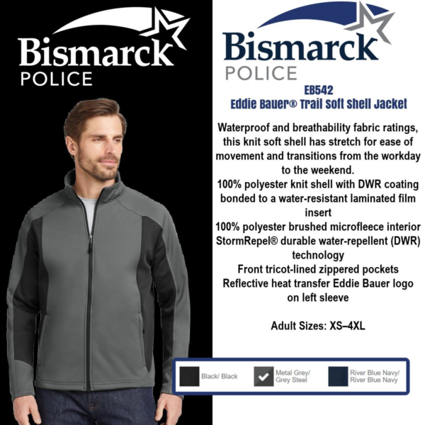 A man wearing a jacket with an advertisement for the bismarck police department.