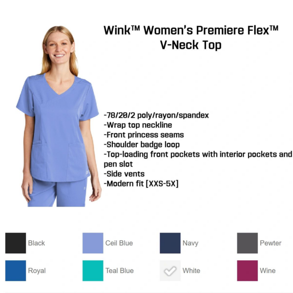 A woman wearing a blue shirt and white pants.