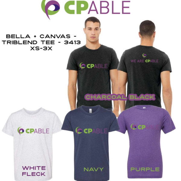 A group of people wearing different colored shirts.
