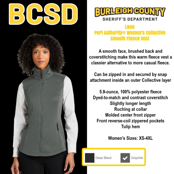 A woman wearing a gray vest with the words " burlington county sheriff 's department ".
