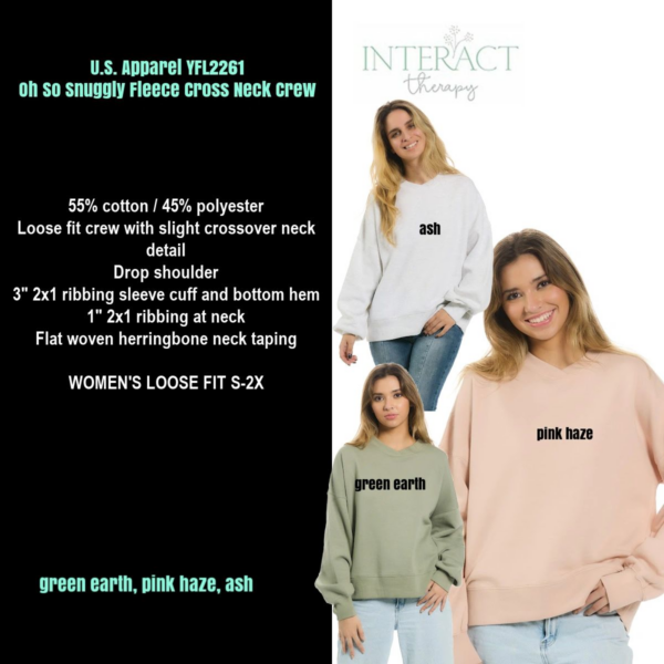 A woman 's sweater with the words " interact sorority."