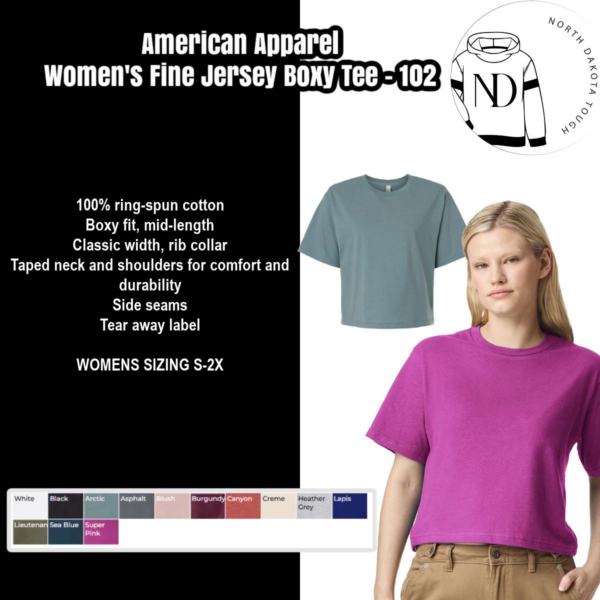 A woman wearing a purple shirt and blue jeans.