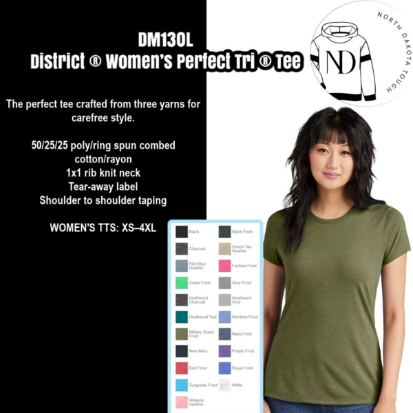 A woman wearing a green shirt and black pants.