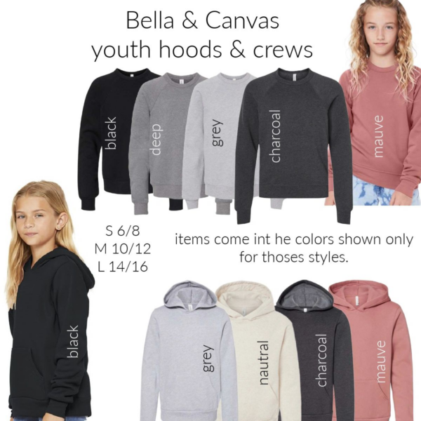 A girl wearing different colored hoodies and a black hoodie