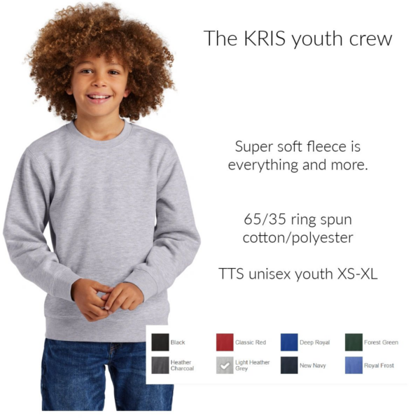 A young boy wearing a sweatshirt and jeans.