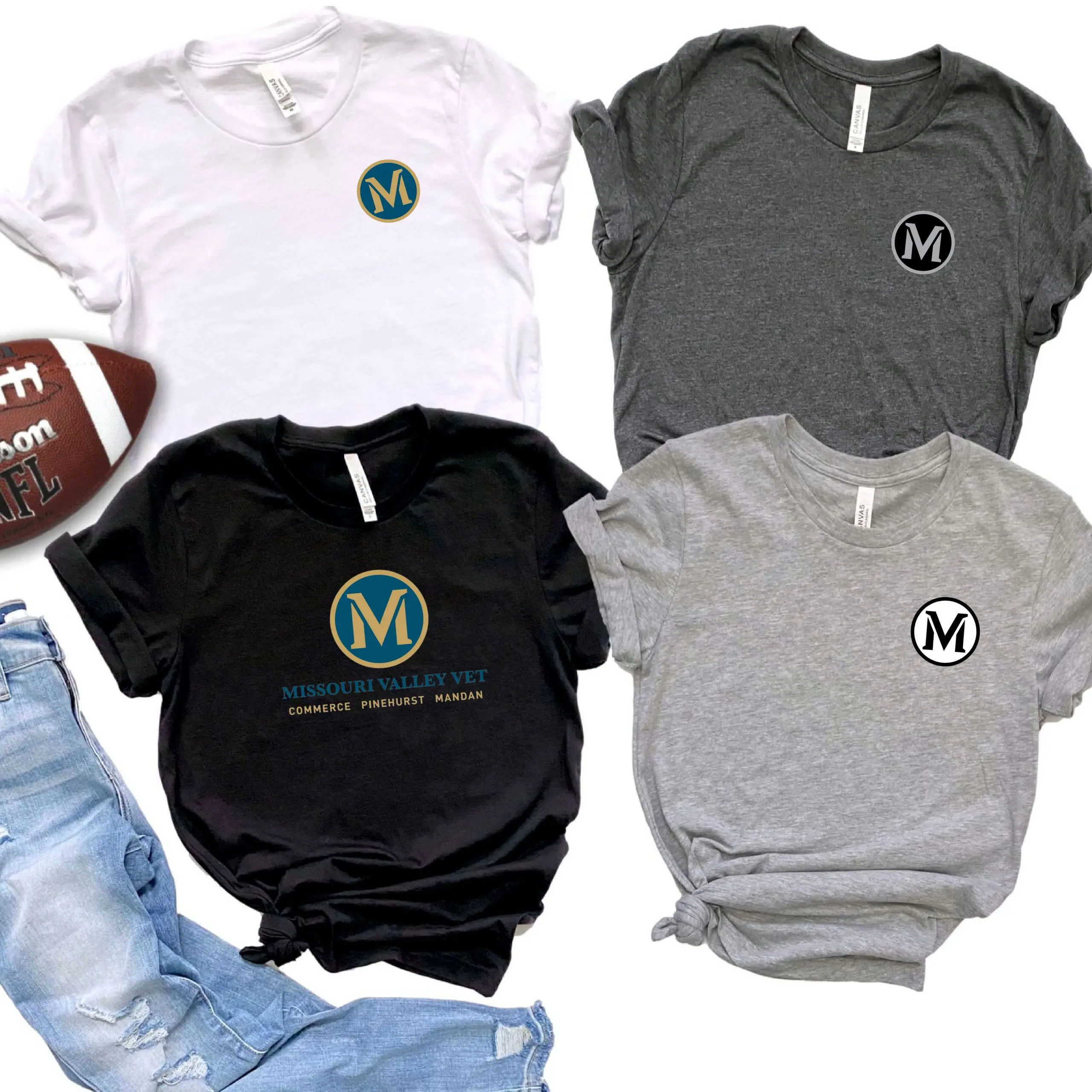 A group of four shirts that are all different colors.