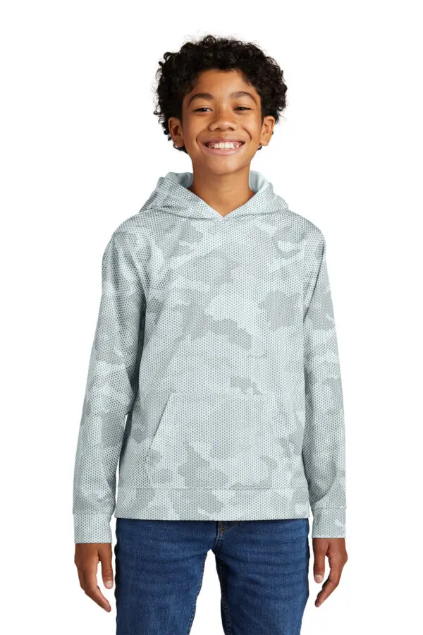 A young boy wearing a white hoodie.