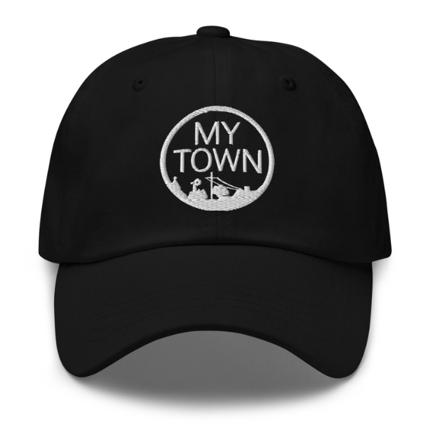 A black hat with the words " my town ".