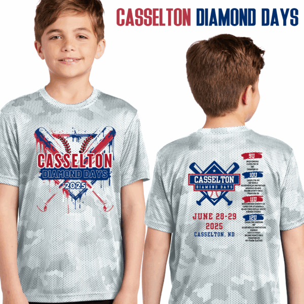 A boy wearing a white shirt with red, blue and white designs.