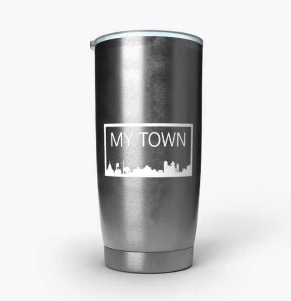 A silver cup with the word " motown " on it.