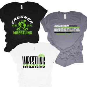 Three wrestling-themed t-shirts in different colors.