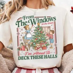 Woman wearing festive Christmas-themed T-shirt.