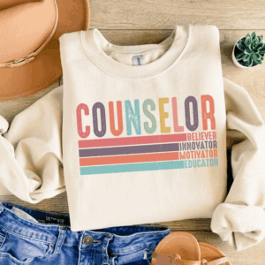 Sweatshirt with "Counselor" and colorful text.