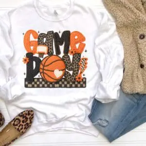 Sweatshirt with "Game Day" basketball design.