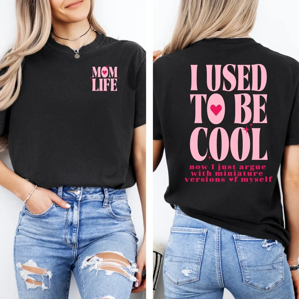 Woman wearing humorous mom-themed black t-shirt.