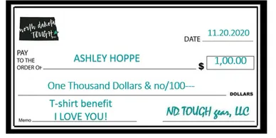 A large check with the words " ashley hoppe $ 1 0, 0 0 0 thousand dollars & no / 1 0 0 " written on