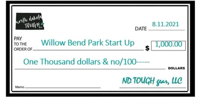 A check that is sitting on top of a table.