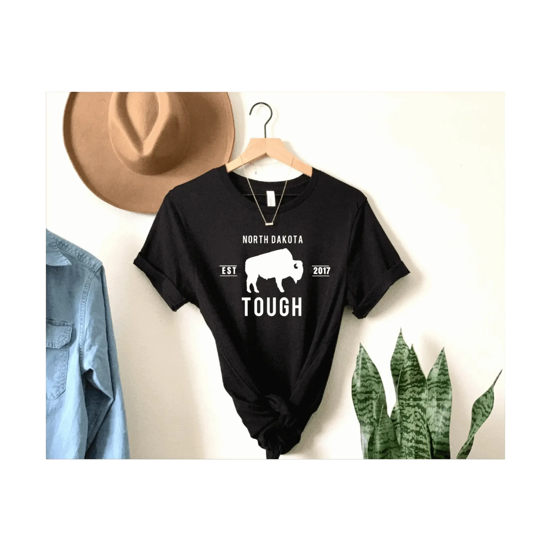 Black "North Dakota Tough" t-shirt display.